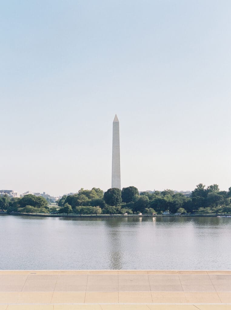 Family milestone session at the Jefferson Memorial in Washington DC — parents celebrating baby’s first birthday with iconic monument views, captured by luxury maternity & newborn photographer Washington DC area.