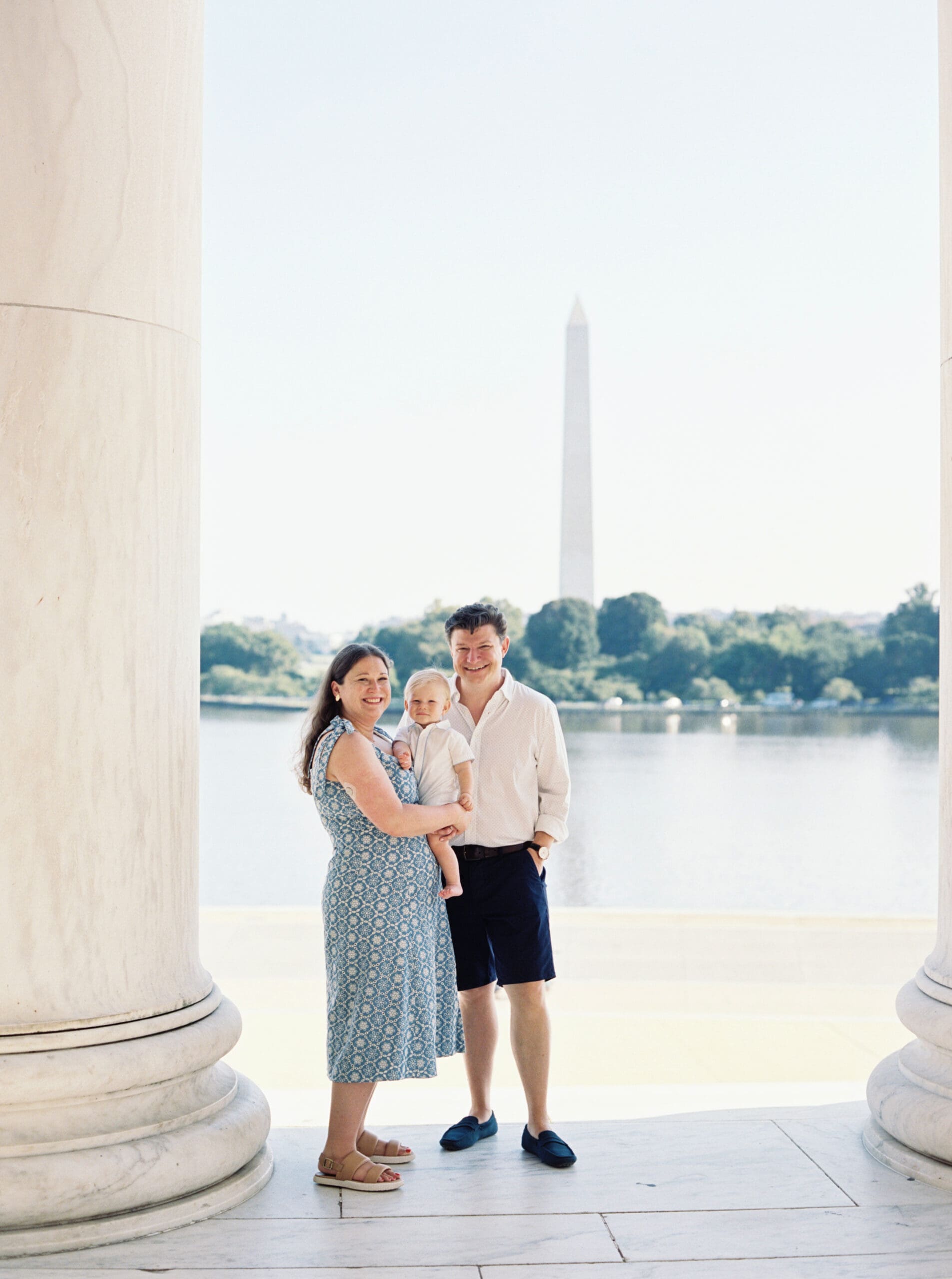 Family milestone session at the Jefferson Memorial in Washington DC — parents celebrating baby’s first birthday with iconic monument views, captured by luxury maternity & newborn photographer Washington DC area.