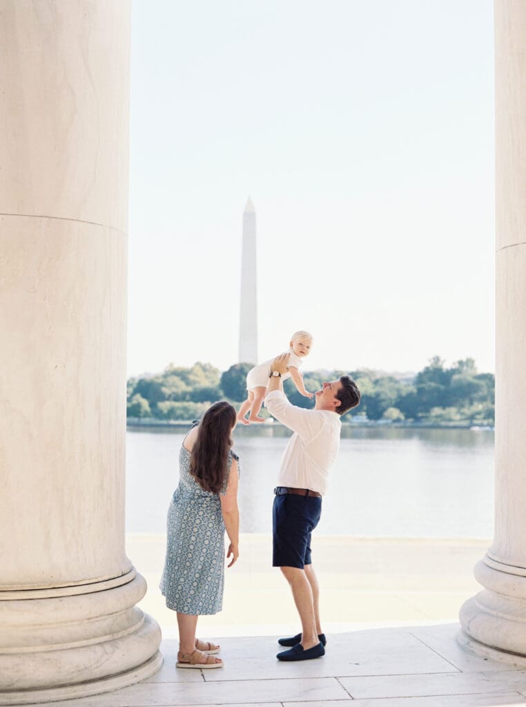 Family milestone session at the Jefferson Memorial in Washington DC — parents celebrating baby’s first birthday with iconic monument views, captured by luxury maternity & newborn photographer Washington DC area.