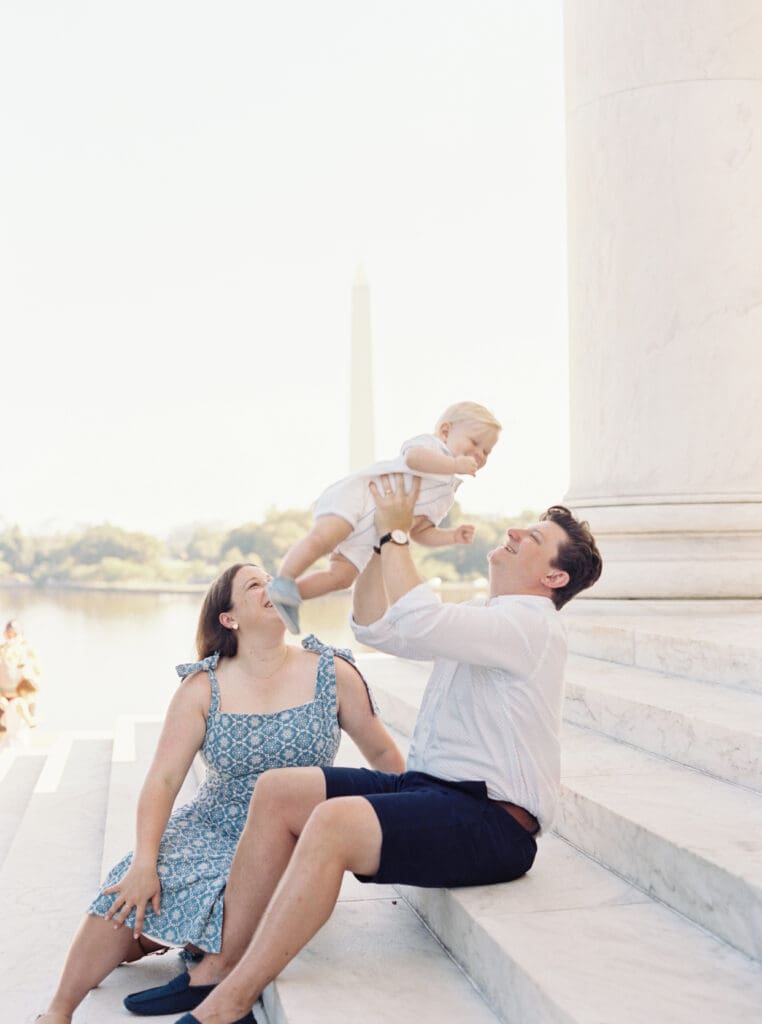 Family milestone session at the Jefferson Memorial in Washington DC — parents celebrating baby’s first birthday with iconic monument views, captured by luxury maternity & newborn photographer Washington DC area.