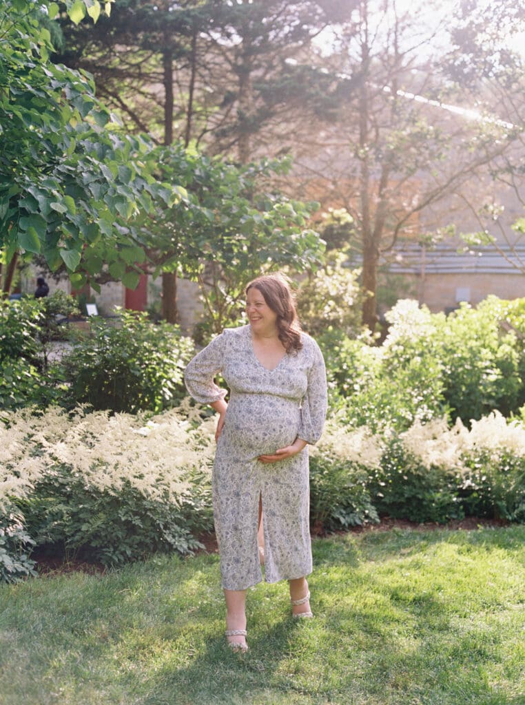 Maternity session at Brookside Gardens — expecting mother walking hand in hand with her husband, captured by luxury maternity & newborn photographer Washington DC area.
