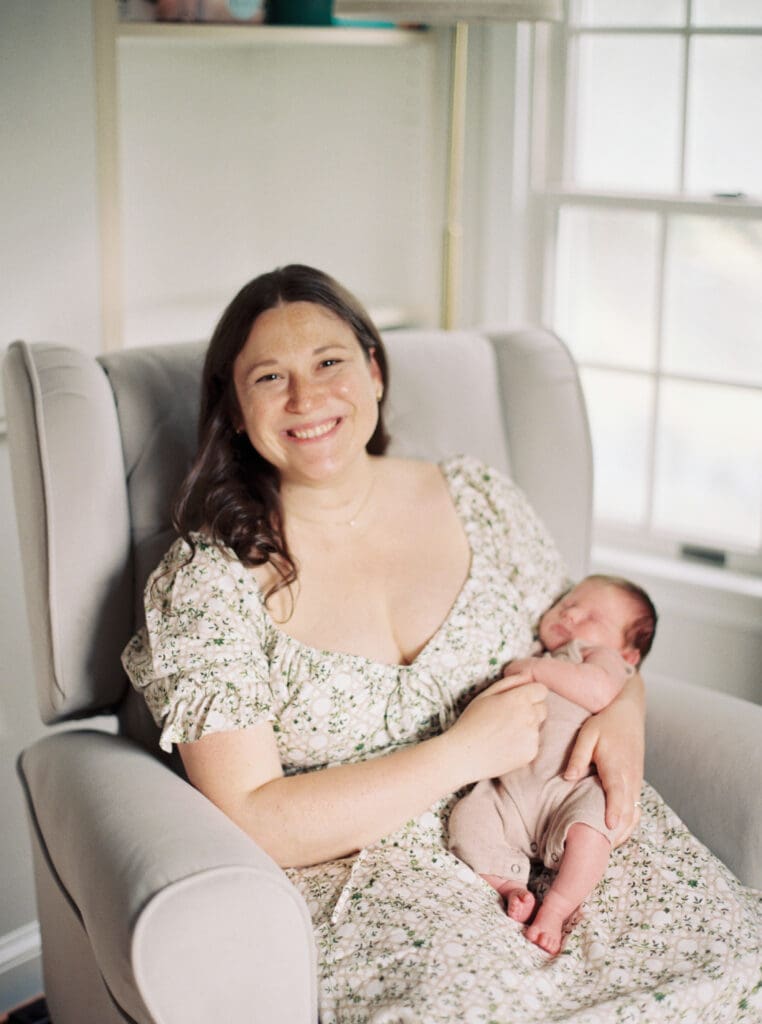 Mother holding her newborn baby boy during an in-home session in Washington DC — intimate lifestyle photos by luxury maternity & newborn photographer Washington DC area